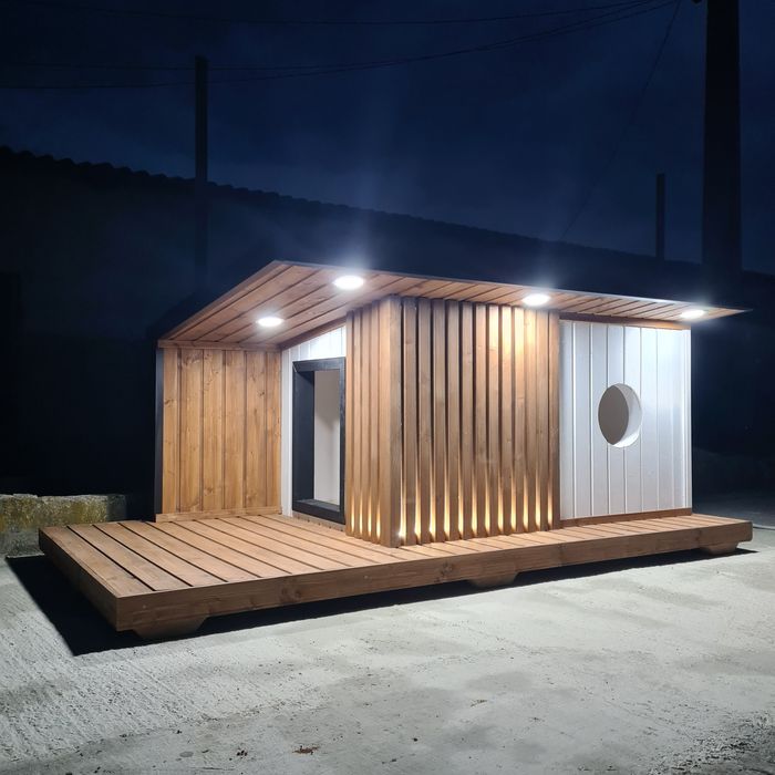 Thermally insulated dog kennel with underfloor heating and exterior LED lighting.